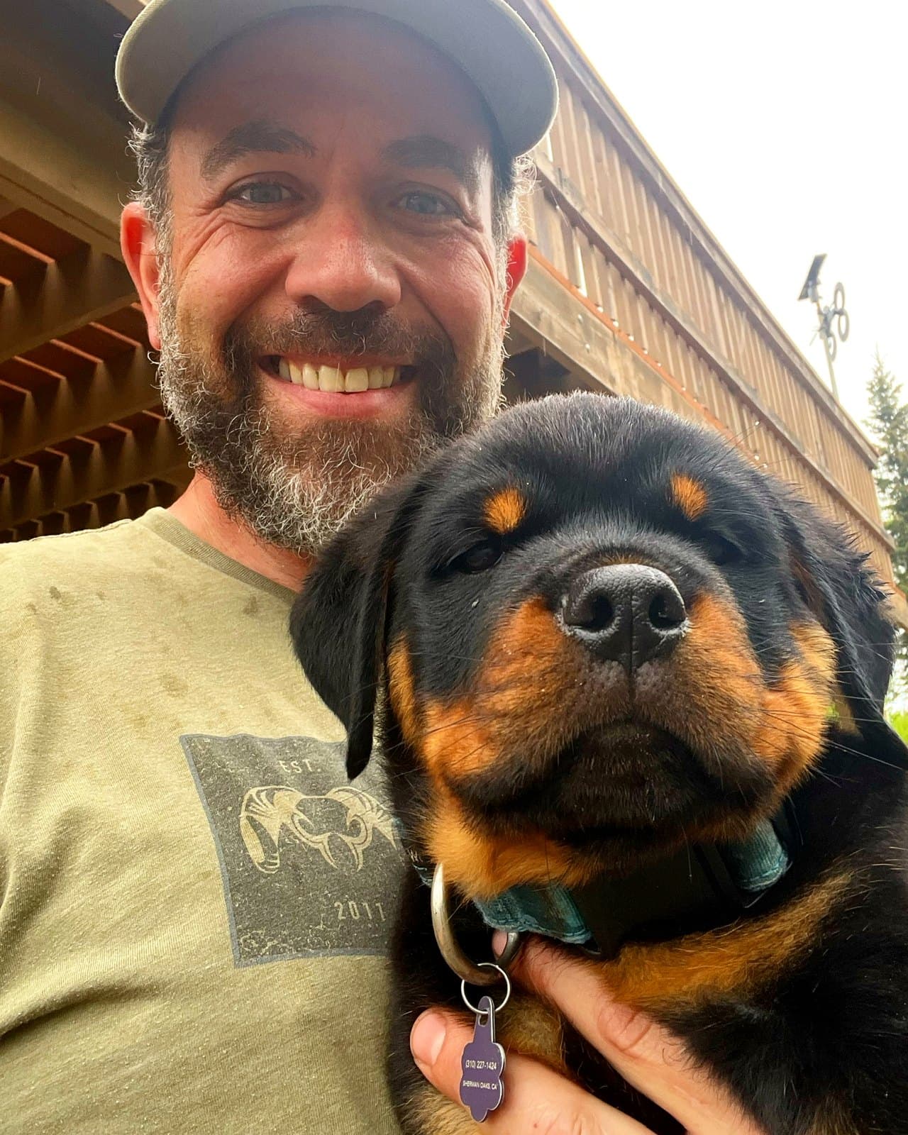 Brett Endes with a Rottweiler puppy