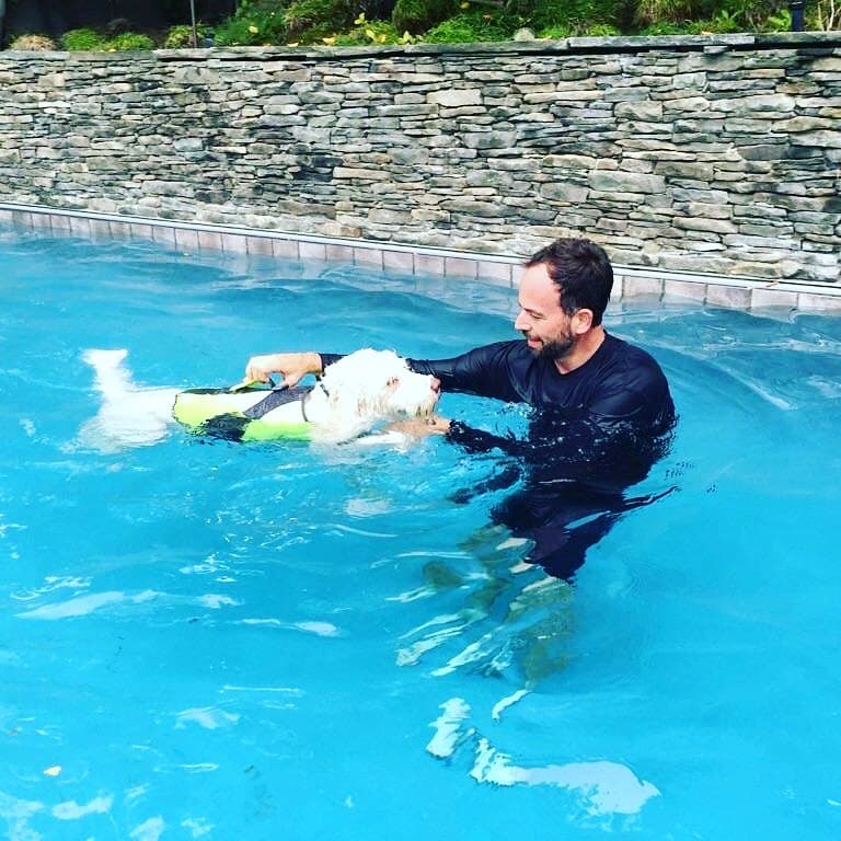 Brett Endes with a calm Rottweiler